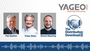 A drone flies low over terrain. Photo by General Atomics.